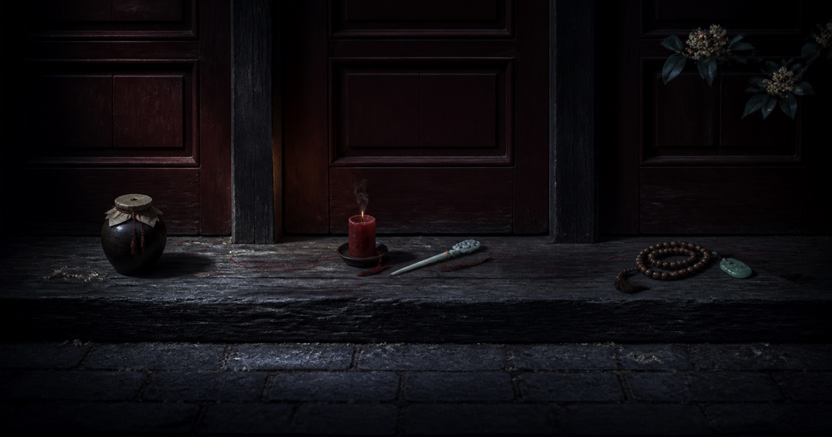 A wine jar, an extinguished wedding candle and hairpin, and prayer beads with a jade pendant wait before three closed palace doors.